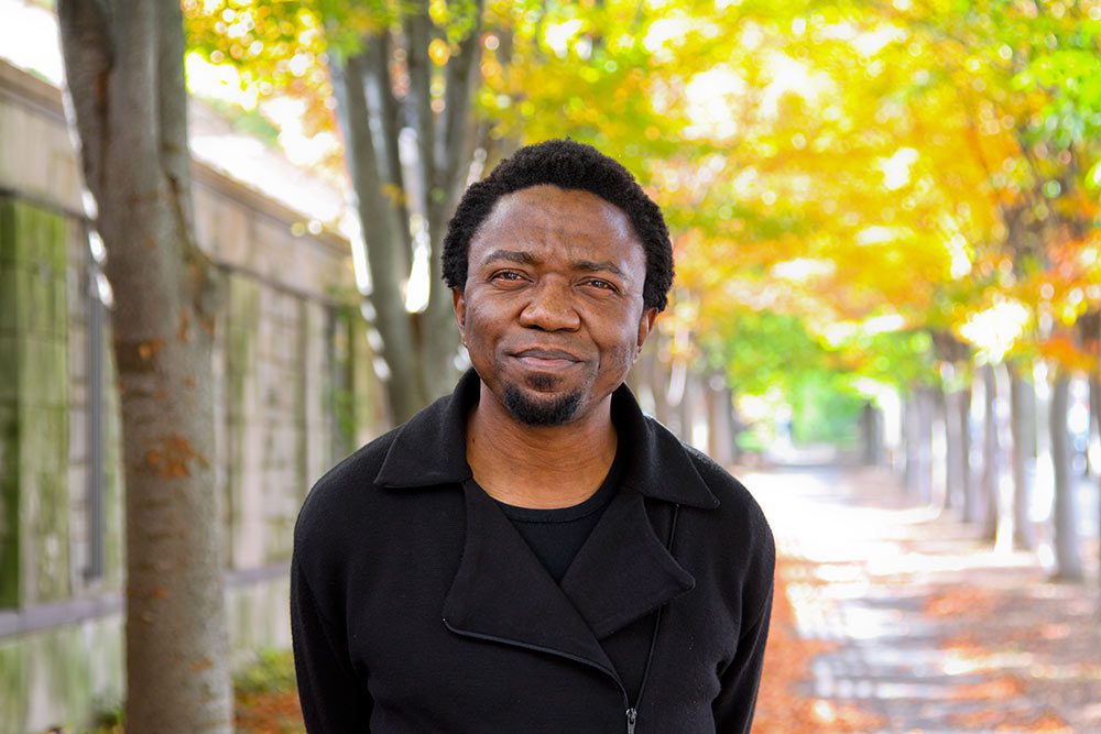Image of Patrice Nganang standing on Nassau Street.