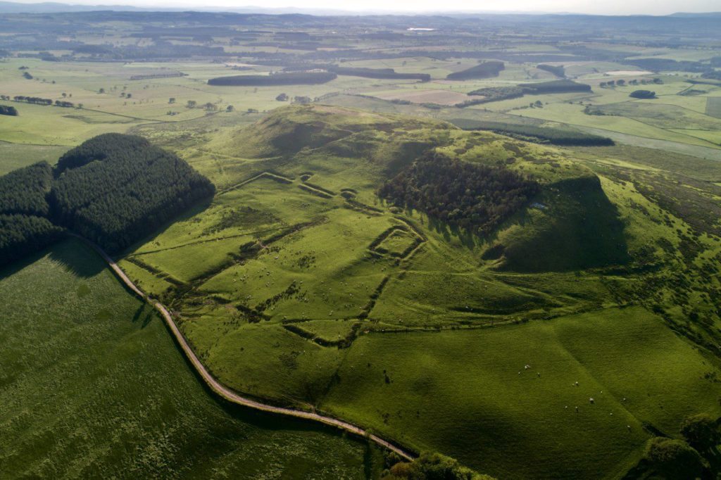 green hills indicating a roman capm